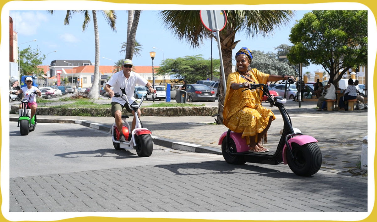 Iguana Ride Curaçao electric scooters lined up for rental